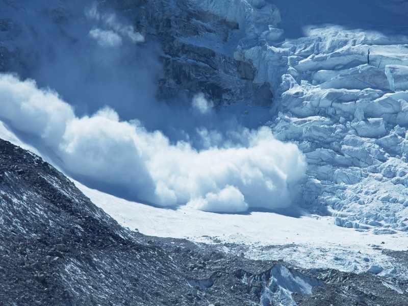 Snowy mountain slope and clouds, symbolizing the avalanche method and tackling high-interest debt first.